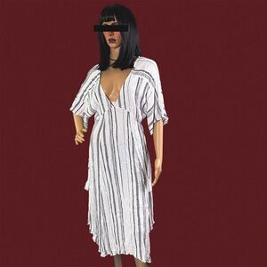 3/$25 White & black striped midi dress with deep V-neckline and flutter sleeves